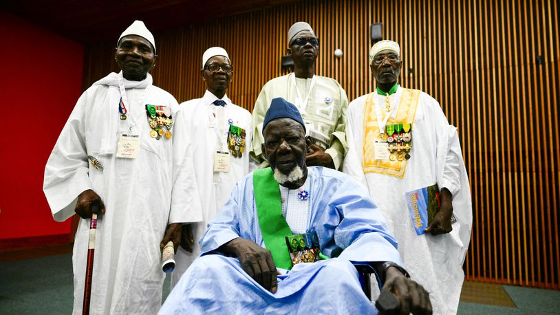 Former Senegalese soldiers pose in Frejus, southeastern France, Thursday, Aug. 15, 2024 ahead of a ceremony marking the 80th anniversary of the Allied landings in Provence during World War II. (Christophe Simon, Pool via AP)