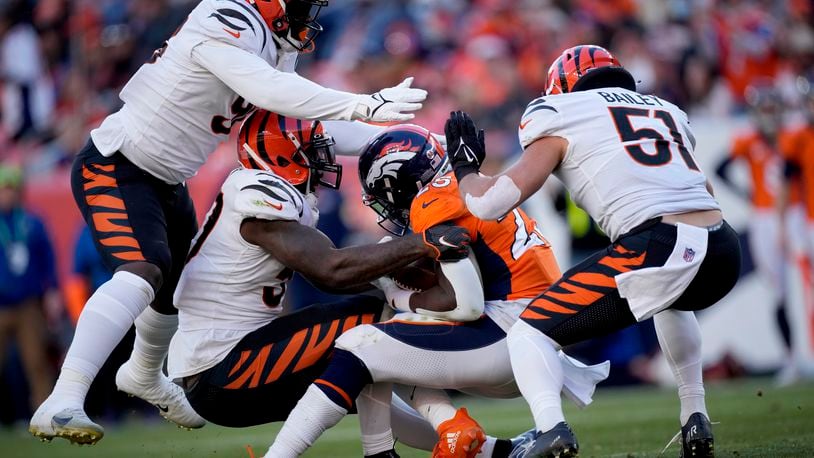 Bengals grind out win in Denver, stay in AFC playoff race