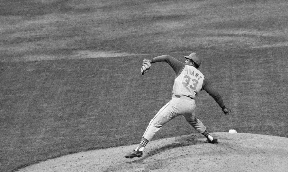 FILE - Luis Tiant of the Cleveland Indians pitches against the New York Yankees in the fourth inning at Yankee Stadium in 1968. (AP Photo/Marty Lederhandler, File)