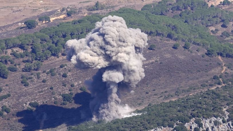 Smoke rises from an Israeli airstrike on the Mahmoudieh mountain, as seen from Marjayoun town, south Lebanon, Tuesday, Sept. 24, 2024. (AP Photo/Hussein Malla)