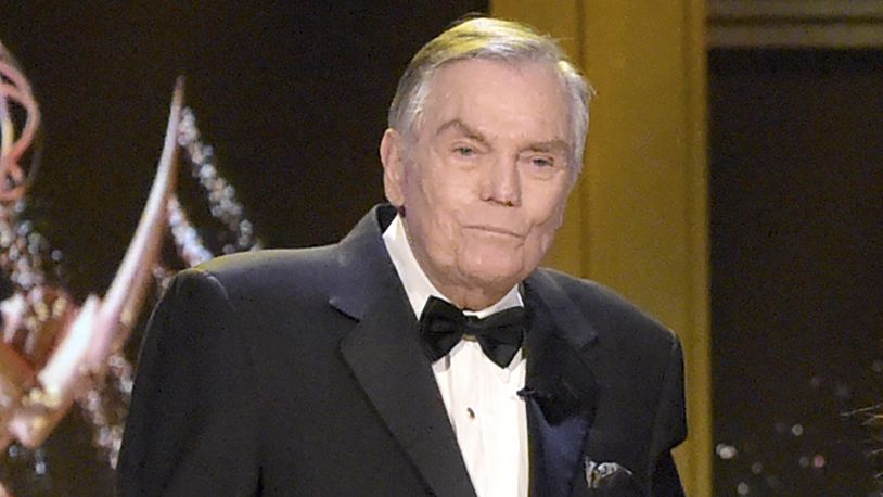 FILE - Host Peter Marshall appears at the 45th annual Daytime Emmy Awards at the Pasadena Civic Center on Sunday, April 29, 2018, in Pasadena, Calif. (Photo by Richard Shotwell/Invision/AP, File)