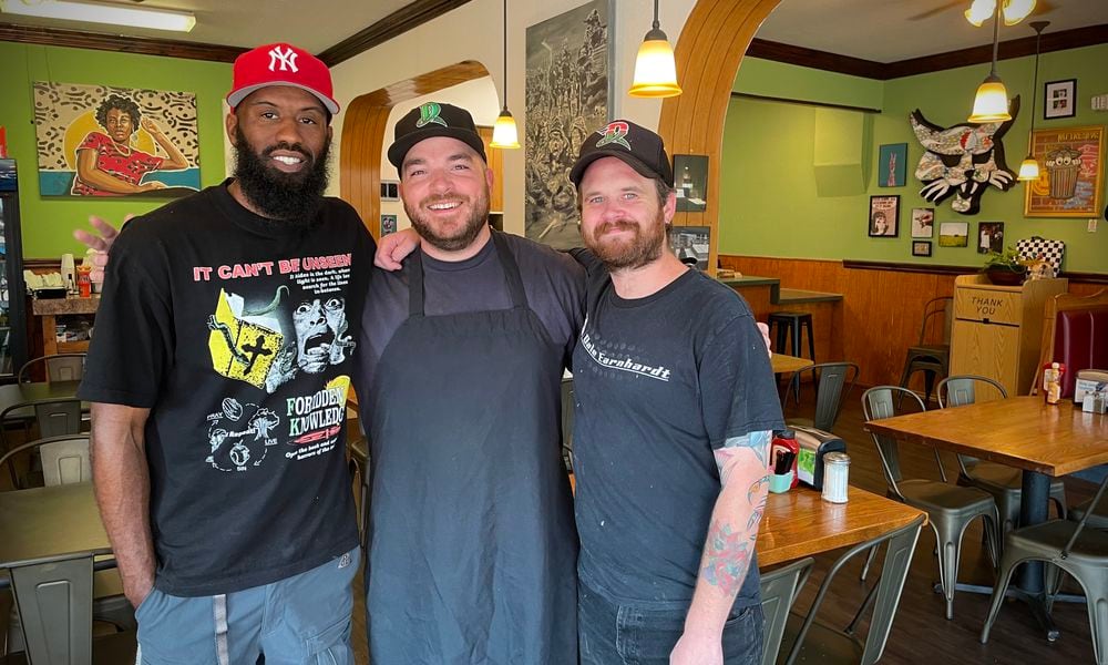 The Ugly Duckling has reopened in a new location at 1430 E. Fifth St. in Daytons St. Annes Hill Historic District. Pictured (left to right) are owners Dexter Clay, also known as Uncle Boof, Zach Jeckering and Mason Schindler. NATALIE JONES/STAFF