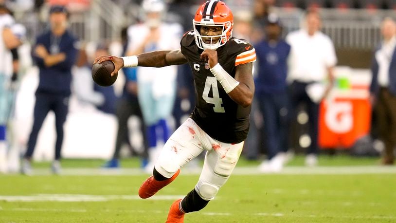 Cleveland Browns quarterback Deshaun Watson (4) runs the ball against the Dallas Cowboys in the second half of an NFL football game in Cleveland, Sunday, Sept. 8, 2024. (AP Photo/Sue Ogrocki)