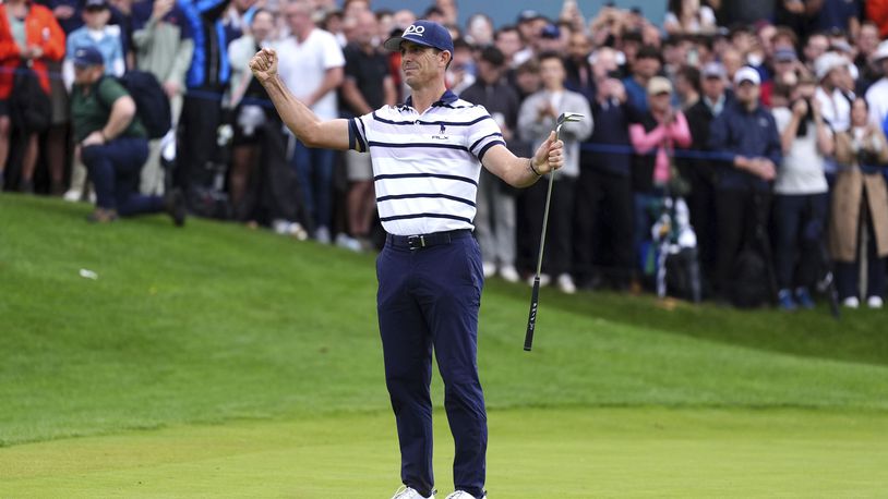 Billy Horschel of the U.S. celebrates victory, following day four of the PGA Championship at Wentworth Golf Club in Virginia Water, England, Sunday Sept. 22, 2024. (Zac Goodwin/PA via AP)