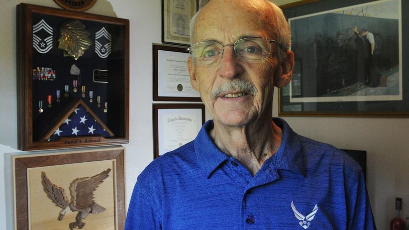 Air Force veteran Dave Babcock at his home in Enon. MARSHALL GORBY\STAFF