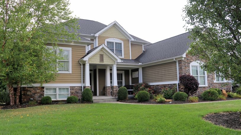 On the market for $649,900, this custom-built home in Troy features many upgrades and creative finishes. Contributed photos by Kathy Tyler