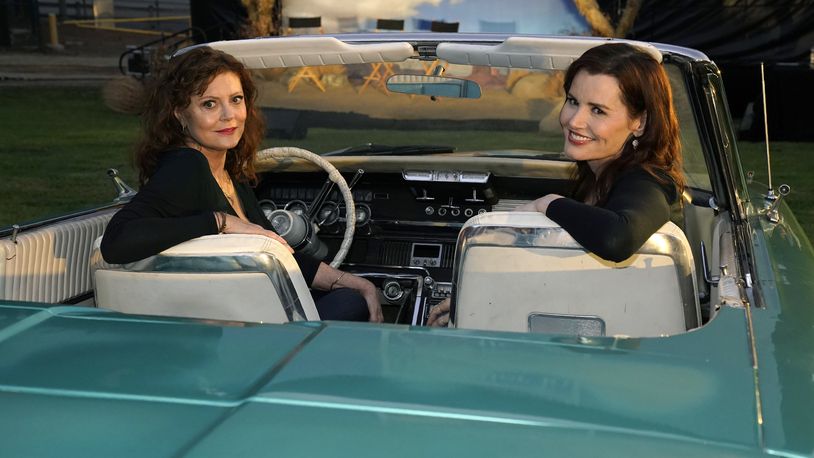 Susan Sarandon, left, and Geena Davis, stars of "Thelma & Louise," pose in a 1966 Ford Thunderbird similar to the one featured in the film, at the 30th anniversary screening of the film at the Greek Theatre on Friday, June 18, 2021, in Los Angeles. (AP Photo/Chris Pizzello)