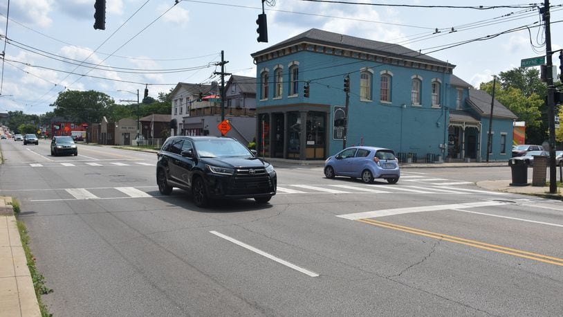 A couple of kids were struck by an SUV at the intersection of Wayne Avenue and Clover Street in southeast Dayton on Monday, July 22, 2024. Vehicles often travel at high speeds through that intersection. CORNELIUS FROLIK / STAFF