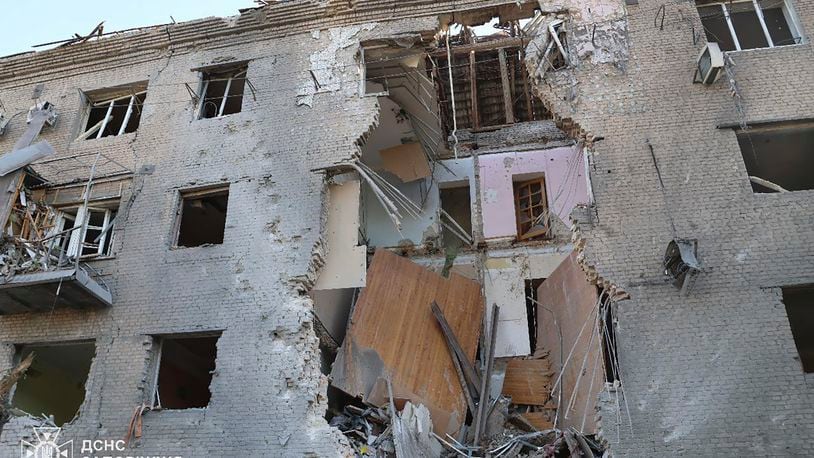 In this photo provided by the Ukrainian Emergency Service, a damaged apartment house is seen after Russia attacked the city with guided bombs overnight in Zaporizhzhia, Ukraine, Sunday, Sept. 29, 2024. (Ukrainian Emergency Service via AP)