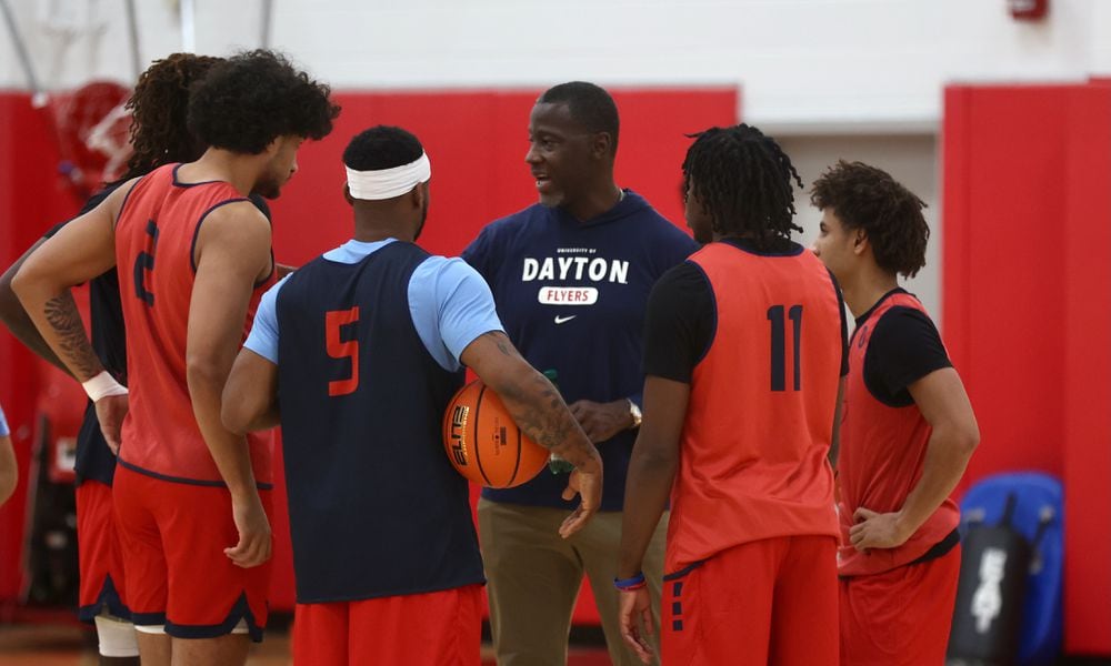 Dayton's Anthony Grant talks to players during a preseason practice on Wednesday, Oct. 2, 2024, at the Cronin Center. David Jablonski/Staff