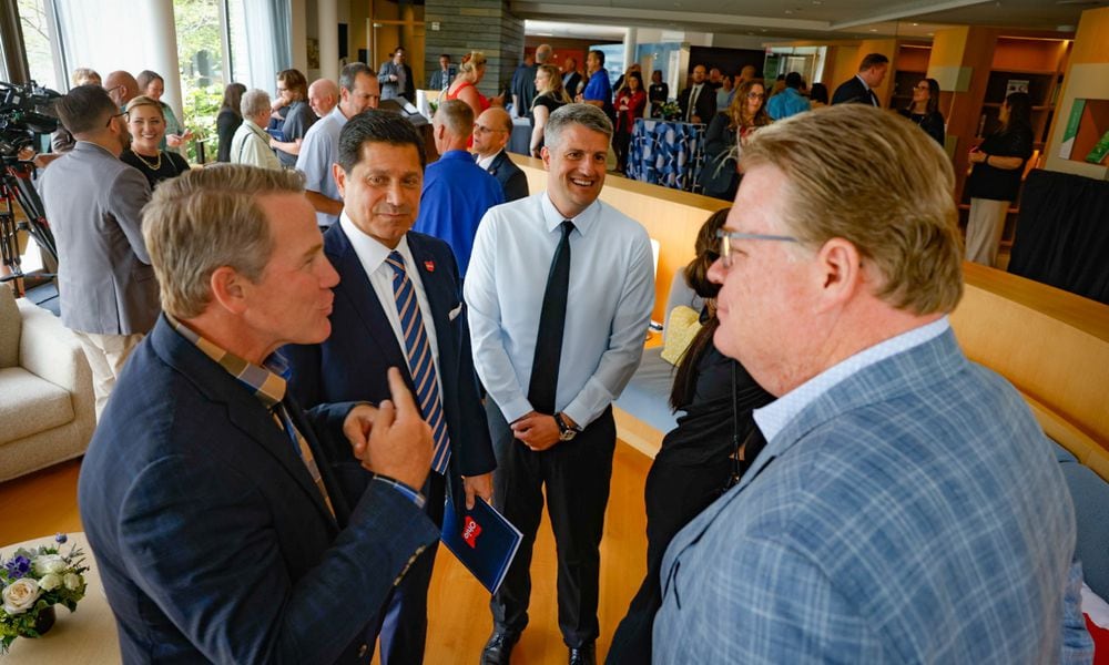 The JobsOhio Small Business Academy, Powered by Aileron was announced on Monday June 17, 2024 in Tipp City. From left, Ohio Lt. Gov. Jon Husted, J.P. Nauseef, president and CEO of JobsOhio; Aileron business coach Wes Gipe and Mike Mathile, chairman of the Aileron board of trustees. JIM NOELKER/STAFF