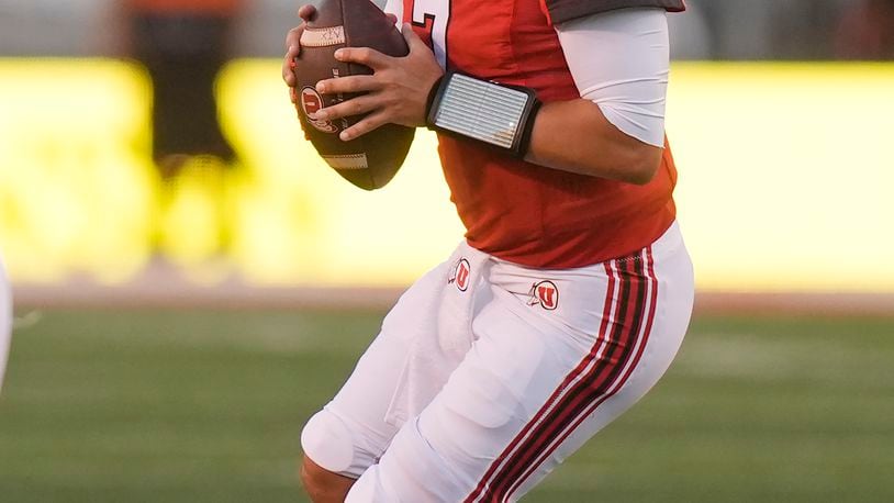 Utah quarterback Cameron Rising (7) looks downfield in the first half of an NCAA college football game against Southern Utah Thursday, Aug. 29, 2024, in Salt Lake City. (AP Photo/Rick Bowmer)