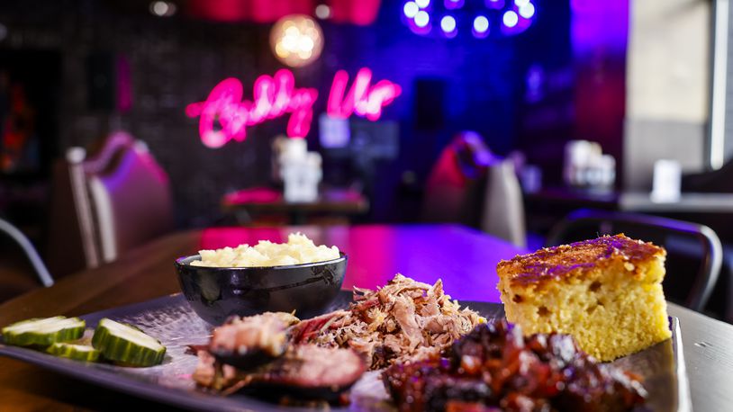 Cowboy Sally's Authentic Texas BBQ is now open at Liberty Center in Liberty Township. This plate shows a sampling of burnt ends, brisket, pulled pork, mashed potatoes and hot honey butter and pepper jack cornbread. NICK GRAHAM/STAFF