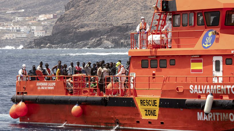 Migrants disembark at the port of on "La Estaca" in Valverde at the Canary island of El Hierro, Spain, Monday, Aug. 26, 2024. Migrants arrived by boat after a thirteen-day voyage from the coast of Senegal. (AP Photo/Maria Ximena)