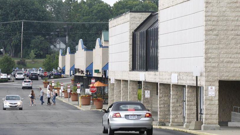 A proposal for re-development of a former Kroger story and adjacent properties in Centerville has been approved by the city’s planning commission and will next go to city council for consideration. This view looking south shows the now-closed Kroger in Centerville Place. STAFF