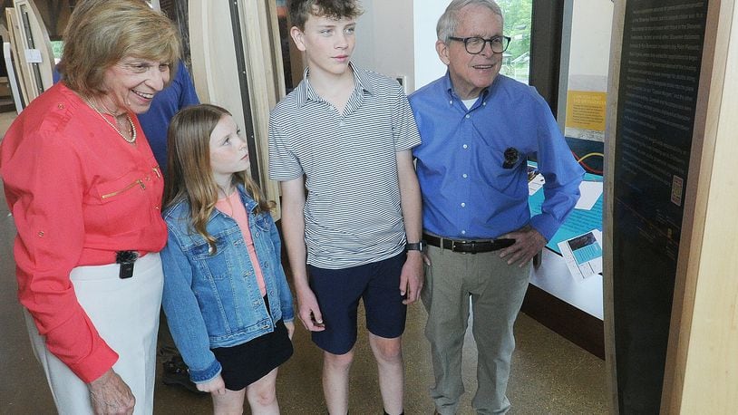 Ohio Governor Mike DeWine and first lady Fran, with grandchildren, Parker and Addie DeWine checkout one of the many historic displays Monday, June 3, 2024. inside the interpretive center at the Great Council State Park near Xenia. MARSHALL GORBY\STAFF