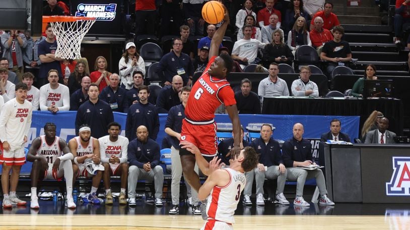 Dayton's Enoch Cheeks dunks in the first half against Arizona in the second round of the NCAA tournament on Saturday, March 23, 2024, at the Delta Center in Salt Lake City, Utah. David Jablonski/Staff