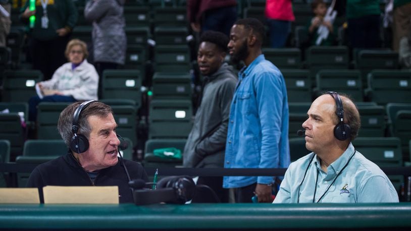 Jim Brown (left), a member of the Wright State Hall of Fame, a former longtime assistant coach and now an analyst on radio for the Raiders, talks to Chris Collins after a game. Joseph Craven/WSU Athletics