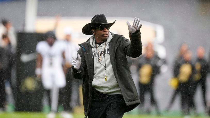 Colorado head coach Deion Sanders directs his team during the first half of an NCAA spring college football game Saturday, April 27, 2024, in Boulder, Colo. (AP Photo/David Zalubowski)