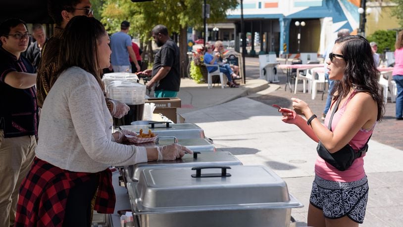 Sip and snack your way through Dayton’s Oregon District on Saturday, Sept. 14. from noon to 6 p.m. with the return of its signature tasting event. TOM GILLIAM / CONTRIBUTING PHOTOGRAPHER