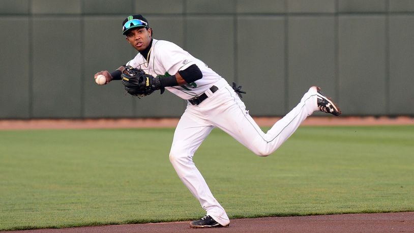 Dayton’s Jose Garcia fields a ball at short during Saturday night’s game at Fifth Third Field. Nick Falzerano/CONTRIBUTED