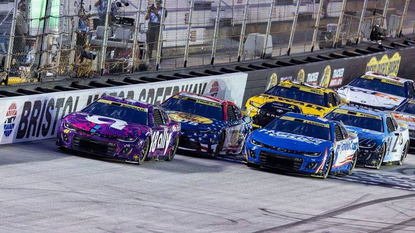 Alex Bowman (48) leads Kyle Larson (5) and Martin Truex Jr. (19) at the start of a NASCAR Cup Series auto race, Saturday, Sept. 21, 2024, in Bristol, Tenn. (AP Photo/Wade Payne)