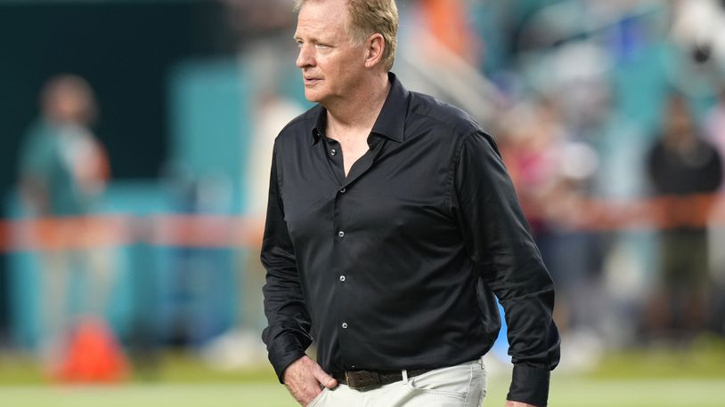 FILE - NFL Commissioner Roger Goodell walks on the field before an NFL football game between the Miami Dolphins and the Buffalo Bills, Sept. 12, 2024, in Miami Gardens, Fla. (AP Photo/Lynne Sladky, File)