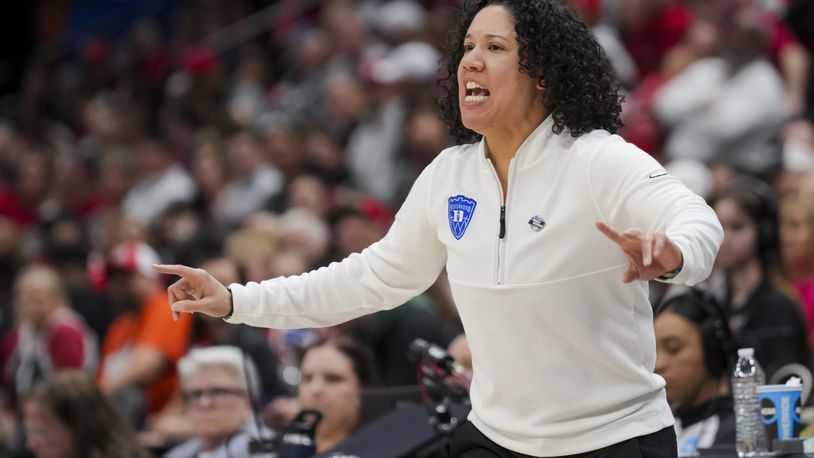 FILE - Duke head coach Kara Lawson works the sideline against Ohio State, March 24, 2024, in Columbus, Ohio. On Monday, June 10, 2024, Lawson hired former Kentucky head coach Kyra Elzy as an assistant, reuniting the former Tennessee teammates on the Blue Devils’ staff. (AP Photo/Aaron Doster, File)