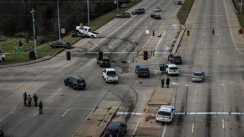 A man reportedly shot at officers before crossing U.S. 35 at Liscum Drive in Dayton to hit two cruisers during a felonious assault investigation in Montgomery County on Monday morning, Jan. 8, 2024. JIM NOELKER/STAFF