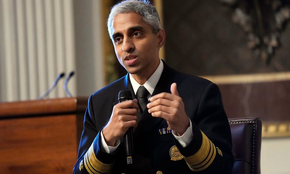 FILE - Surgeon General Dr. Vivek Murthy speaks during an event on the White House complex in Washington, April 23, 2024. Murthy is asking Congress to require warning labels on social media platforms that are similar to those that appear on cigarette boxes. (AP Photo/Susan Walsh, File)