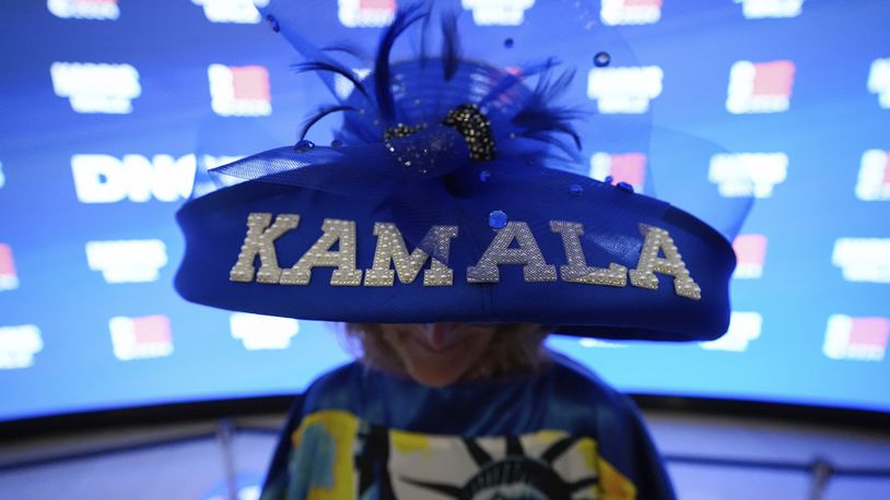 Mississippi delegate Kelly Jacobs wears a hat during the Democratic National Convention, Monday, Aug. 19, 2024, in Chicago. (AP Photo/Brynn Anderson)