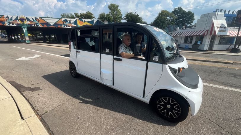 GEST Dayton, a new electric cart ride service, offered free rides in downtown Dayton during Art in the City on Saturday, Aug. 3, 2024. CORNELIUS FROLIK / STAFF