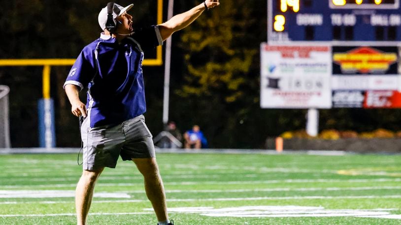 Valley View football coach Matt King yells to his team during their win win over Brookville Friday, Oct. 13, 2023 at Valley View's Niswonger Field in Germantown. The Spartans travel to Bellbrook on Friday night. NICK GRAHAM/STAFF