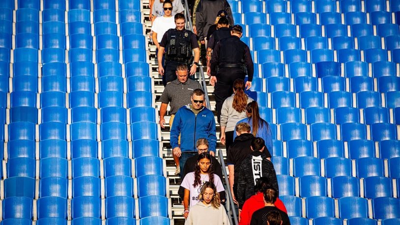 Miamisburg High School students and staffers, along with area first responders and active-duty U.S. military, walk up and down the bleachers at the school's Holland Field on Monday, Sept. 9, 2024. The stair climb event paid tribute to the first responders who gave their lives attempting to save those trapped in the World Trade Center in New York City during the Sept. 11, 2001 terrorist attacks. CONTRIBUTED