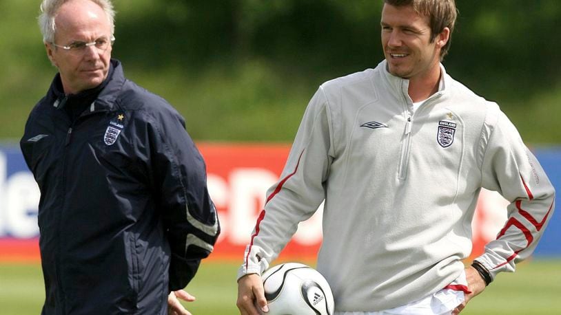 FILE - England's manager Sven-Goran Eriksson, left and player David Beckham are photographed during a training session, in Manchester, England, June 1, 2006. Eriksson the Swedish soccer manager who spent five years as England’s first ever foreign-born coach, has died. He was 76, it was announced on Monday, Aug. 26, 2024. (Martin Rickett/PA via AP, File)