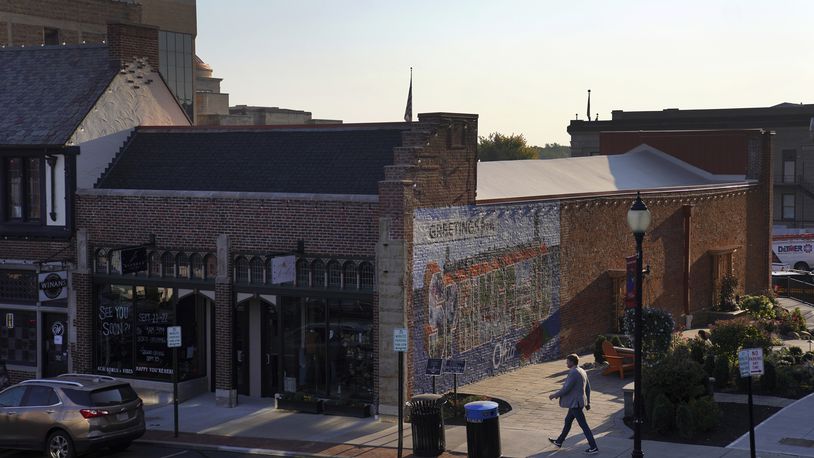 A man walks through Downtown Springfield, Ohio, Monday, Sept. 16, 2024. (AP Photo/Jessie Wardarski)