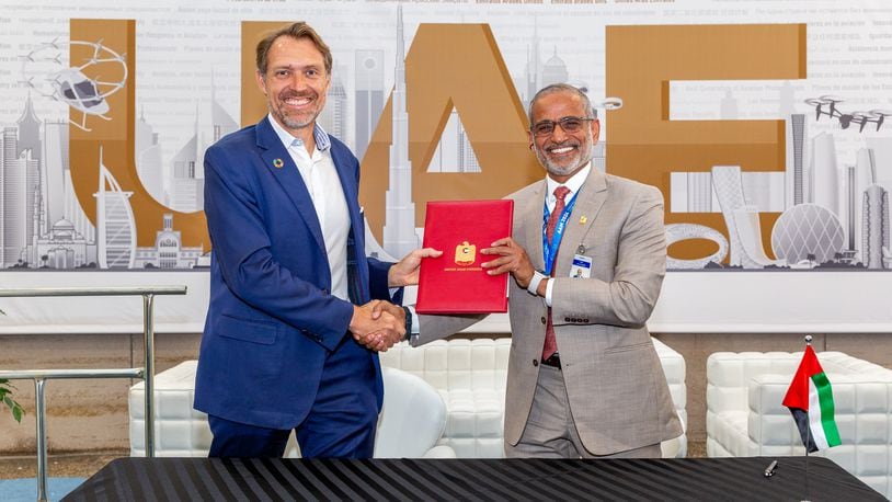 joeBen Bevirt, founder and chief executive of Joby, presents the company’s letter of intent to initiate Joby’s air operator certificate application to Saif Mohammed Al Suwaidi, director General of the UAE General Civil Aviation Authority. Christina Esteban Photography