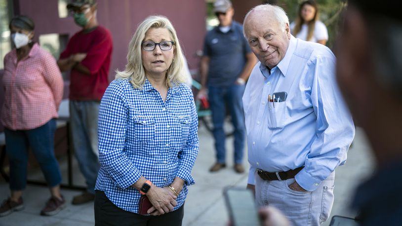 FILE - Rep. Liz Cheney, R-Wyo., arrives, with her father, former Vice President Dick Cheney, to vote at the Teton County Library during the Republican primary election Aug. 16, 2022, in Jackson Hole, Wyo. (Jabin Botsford/The Washington Post via AP, File)