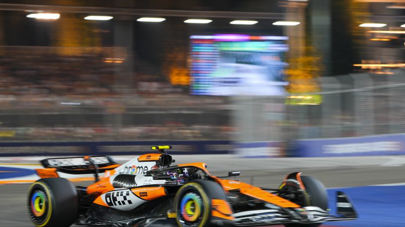 McLaren driver Lando Norris of Britain steers his car during the Singapore Formula One Grand Prix at the Marina Bay Street Circuit, in Singapore, Sunday, Sept. 22, 2024. (AP Photo/Vincent Thian)