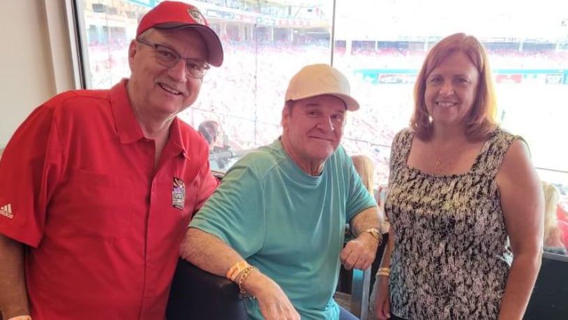 Rick McCrabb and his wife, Tammy, spent time with Cincinnati Reds legend Pete Rose during a 2021 game at Great American Ball Park. SUBMITTED PHOTO