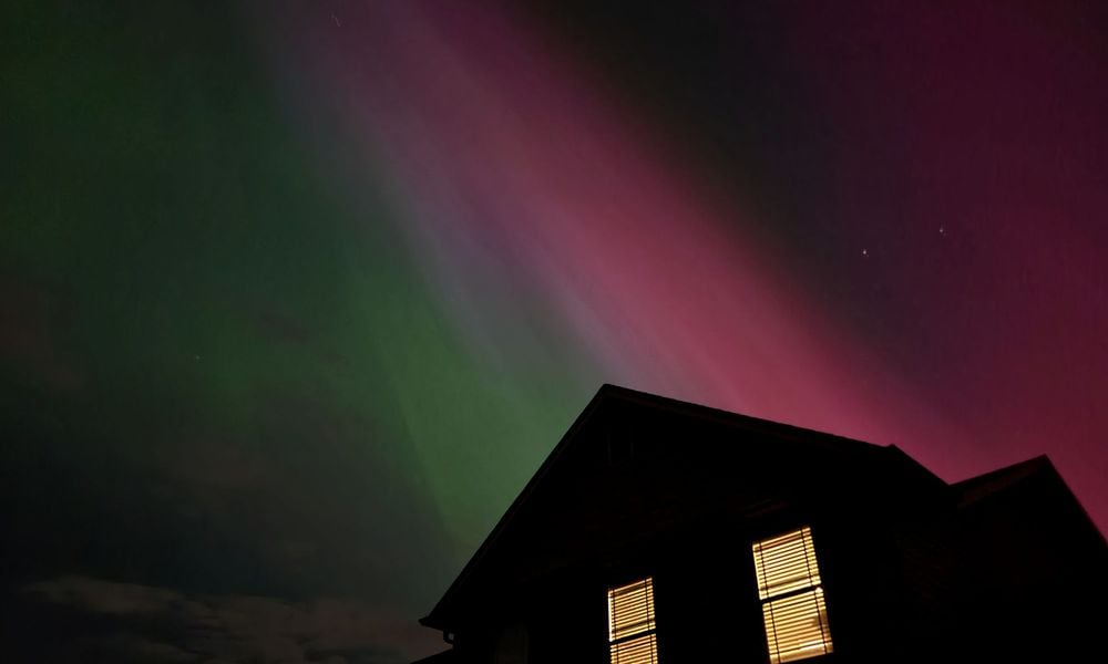 A large geomagnetic storm caused the Northern Lights to be visible in the Miami Valley. Photos taken in Madison Twp., Butler County NICK GRAHAM, STAFF