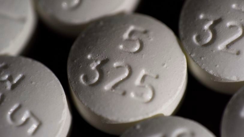 FILE - An arrangement of pills of the opioid oxycodone-acetaminophen in New York. Idaho officials on Friday, May 13, 2022, agreed to a $119 million settlement with drugmaker Johnson & Johnson and three major distributors over their role in the opioid addiction crisis. (AP Photo/Patrick Sison, File)