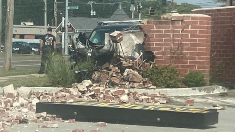 At least one person was injured after a crash into a Waffle House sign in Dayton. CONTRIBUTED/JALEN WHARTON