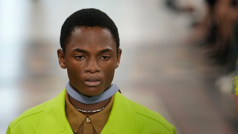 A model wears a creation as part of the Gucci men's Spring Summer 2025 collection, that was presented in Milan, Italy, Monday, June 17, 2024. (AP Photo/Luca Bruno)