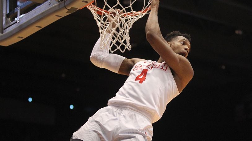 Dayton’s Charles Cooke misses a dunk in the first half. David Jablonski/Staff