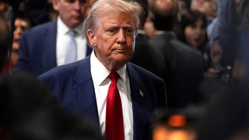 Republican presidential nominee former President Donald Trump speaks to reporters in the spin room after a presidential debate with Democratic presidential nominee Vice President Kamala Harris, Tuesday, Sept. 10, 2024, in Philadelphia. (AP Photo/Matt Slocum)