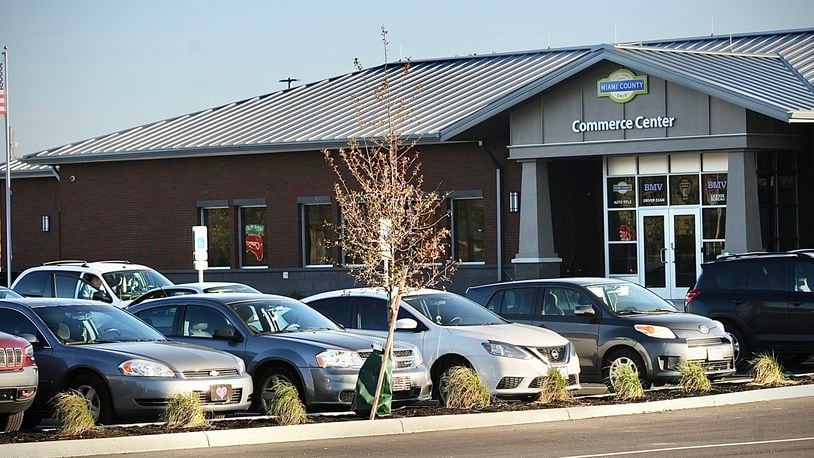 A new “One Stop Shop” for Miami County motor vehicle-related services, including the Bureau of Motor Vehicles, opened officially Thursday at Ohio 55 and Barnhart Road, just west of Interstate 75 in Troy. MARSHALL GORBY / STAFF