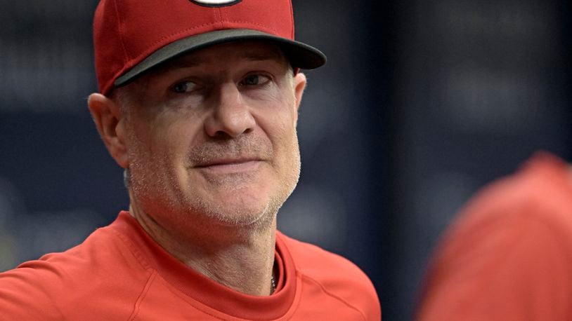 FILE - Cincinnati Reds manager David Bell stands in the dugout during a baseball game against the Tampa Bay Rays, July 28, 2024, in St. Petersburg, Fla. (AP Photo/Steve Nesius, File)