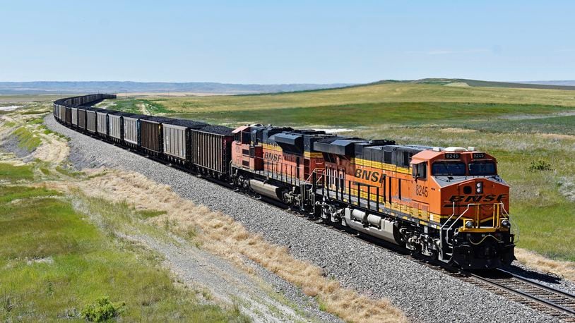 A BNSF railroad train hauling carloads of coal from the Powder River Basin of Montana and Wyoming is seen east of Hardin, Mont., July 15, 2020. (AP Photo/Matthew Brown, File)