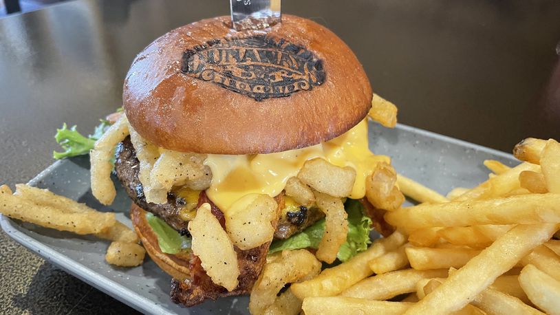 After reopening under new ownership in March, Dunaways in Troy has officially opened its kitchen this week with elevated bar food. NATALIE JONES/STAFF